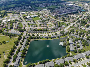 High angle view of river amidst buildings in city