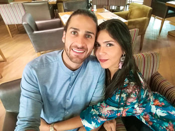 Portrait of smiling young couple
