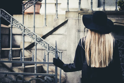 Rear view of woman wearing hat