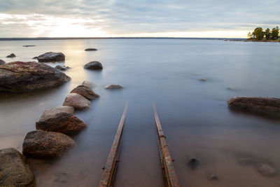 Scenic view of sea against sky during sunset