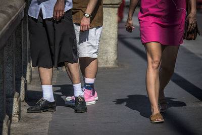 Low section of people walking outdoors