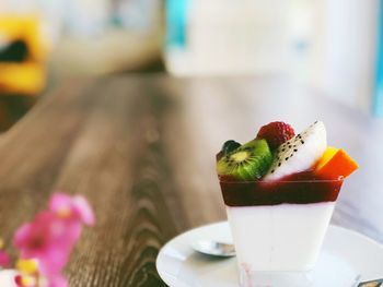 Close-up of fruits in plate on table