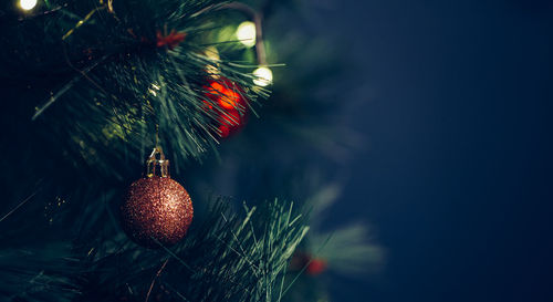 Close-up of christmas decoration hanging on tree