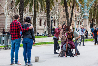 People on street in city