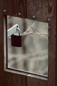 Close-up of padlocks on railing