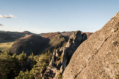 Scenic view of rocky mountains against clear sky