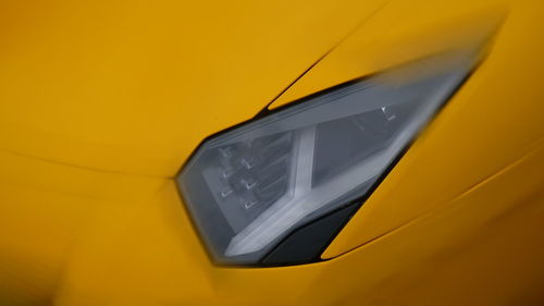 Close-up of yellow car