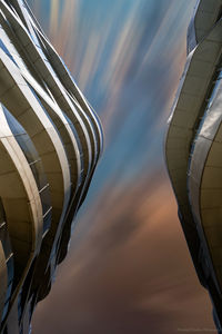 Low angle view of building against sky during sunset