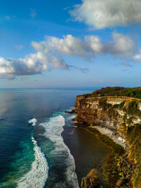 Scenic view of sea against sky - uluwatu cliff