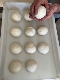 Close-up in a pizza dough in a fireproof pan