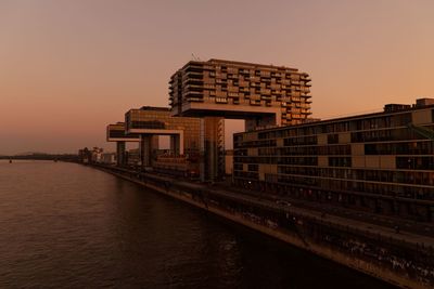 Cologne kranhauses against sky at sunset