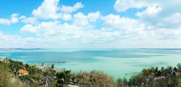 Scenic view of sea against cloudy sky