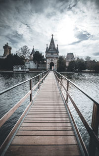 Bridge over river against sky