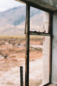 Close-up of old window on building
