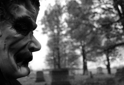 Close-up portrait of young man looking away