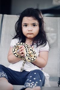 Portrait of a girl sitting at home