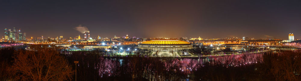 Illuminated buildings in city at night