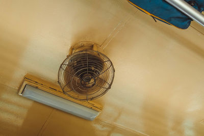 Close-up high angle view of electric fan