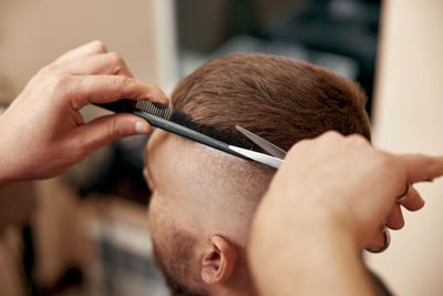 Close-up of man working at home