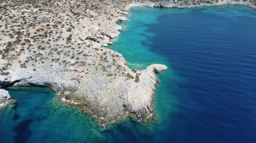 High angle view of rocks in sea