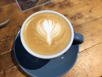 High angle view of cappuccino on table