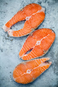 Close-up of salmon fillet on marble