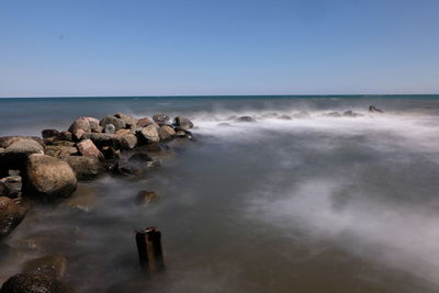 Scenic view of sea against clear sky