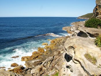 Scenic view of sea against clear sky