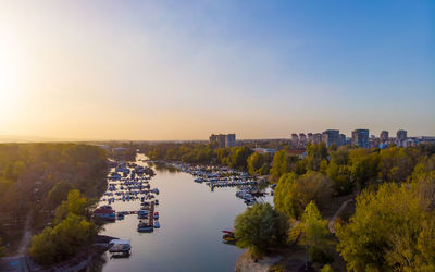 High angle view of river amidst buildings in city