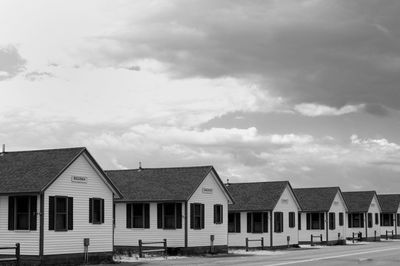 Houses against sky in city