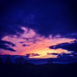 Scenic view of dramatic sky during sunset