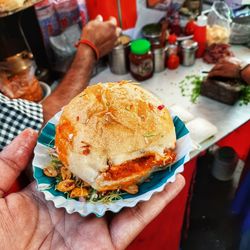 Close-up of hand holding food