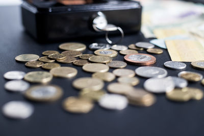 Close-up of coins on table