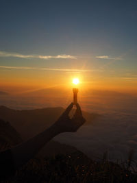 Sun shining over landscape
