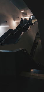 Low angle view of illuminated staircase in building