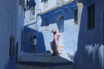 Man standing by building