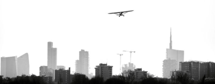 Low angle view of modern buildings against clear sky