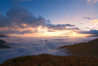 Scenic view of dramatic sky over land