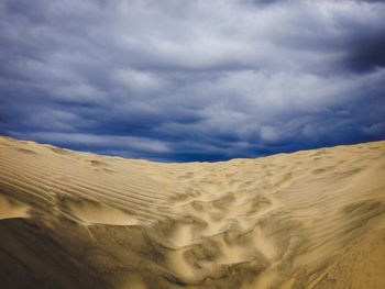 Scenic view of desert against sky