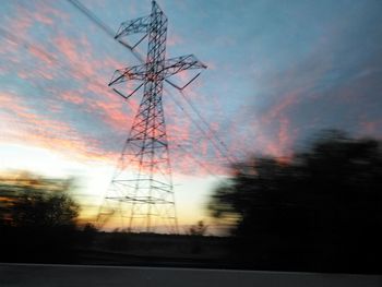 Electricity pylon at sunset