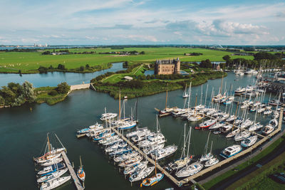 High angle view of boats moored at harbor