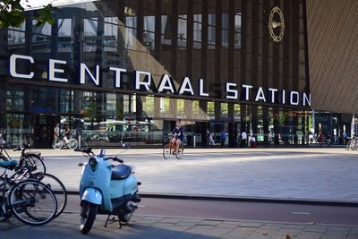 Side view of people walking on road