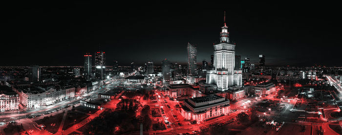 Illuminated buildings in city at night