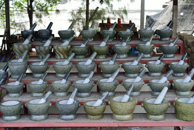 Mortar and pestles arranged at market stall