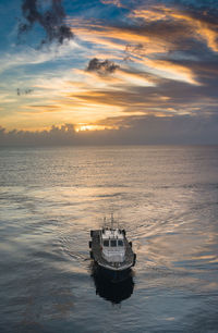 Scenic view of sea against sky during sunset on board a cruisliner