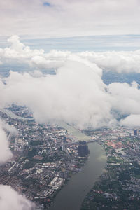 Aerial view of cityscape against sky