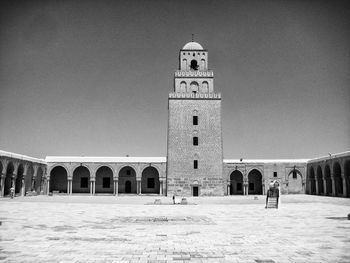 Sidi oqba mosque against sky on sunny day