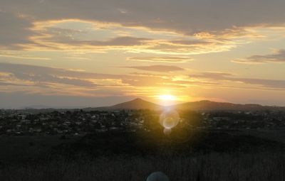 Sun shining through clouds