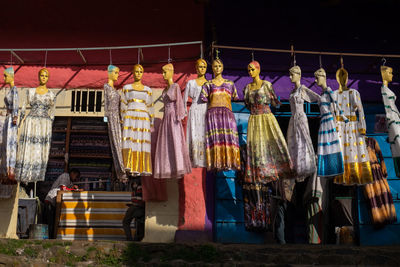 Clothes hanging in store for sale at market stall