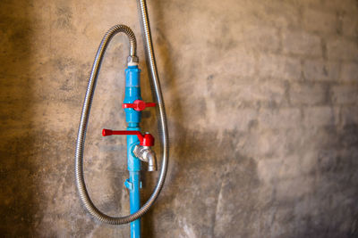 Close-up of toy hanging on wall
